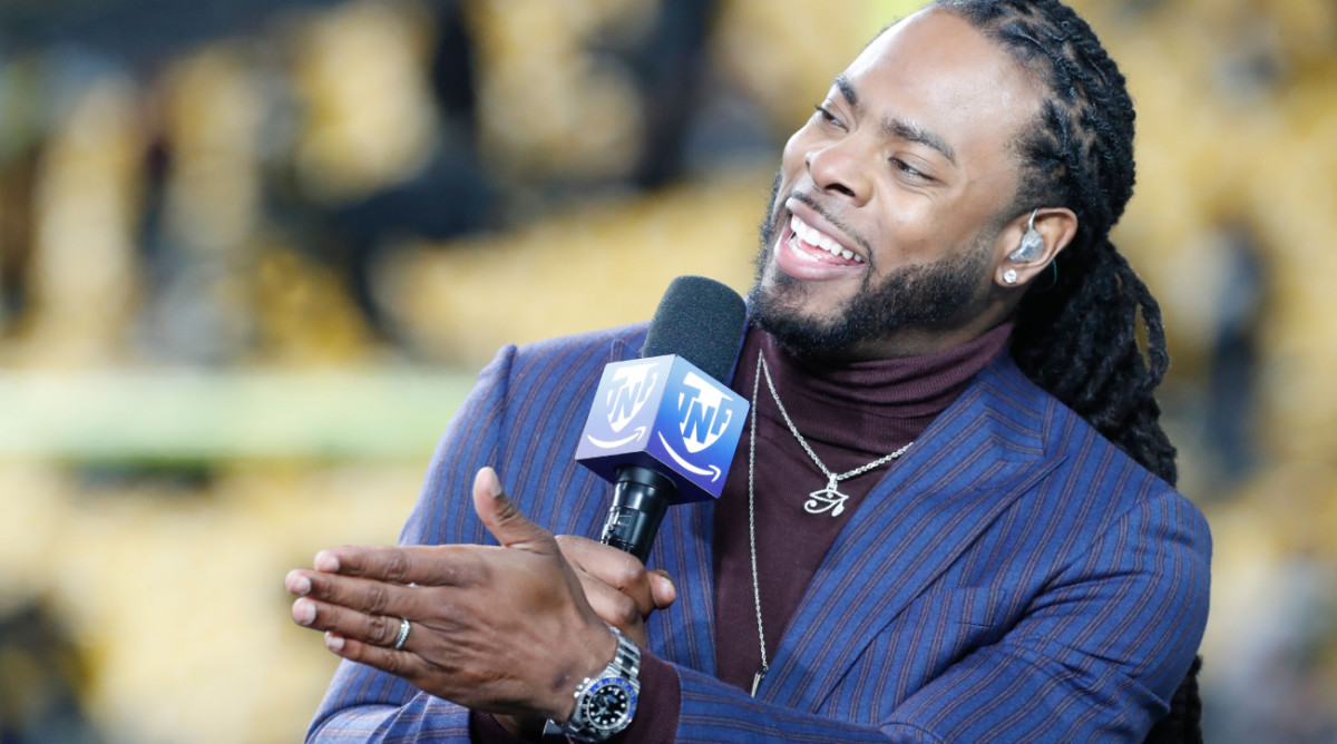 Dec 7, 2023; Pittsburgh, Pennsylvania, USA; Amazon Prime Video Thursday Night Football analyst Richard Sherman performs the pre-game broadcast before the Pittsburgh Steelers host the New England Patriots at Acrisure Stadium. Mandatory Credit: Charles LeClaire-USA TODAY Sports  