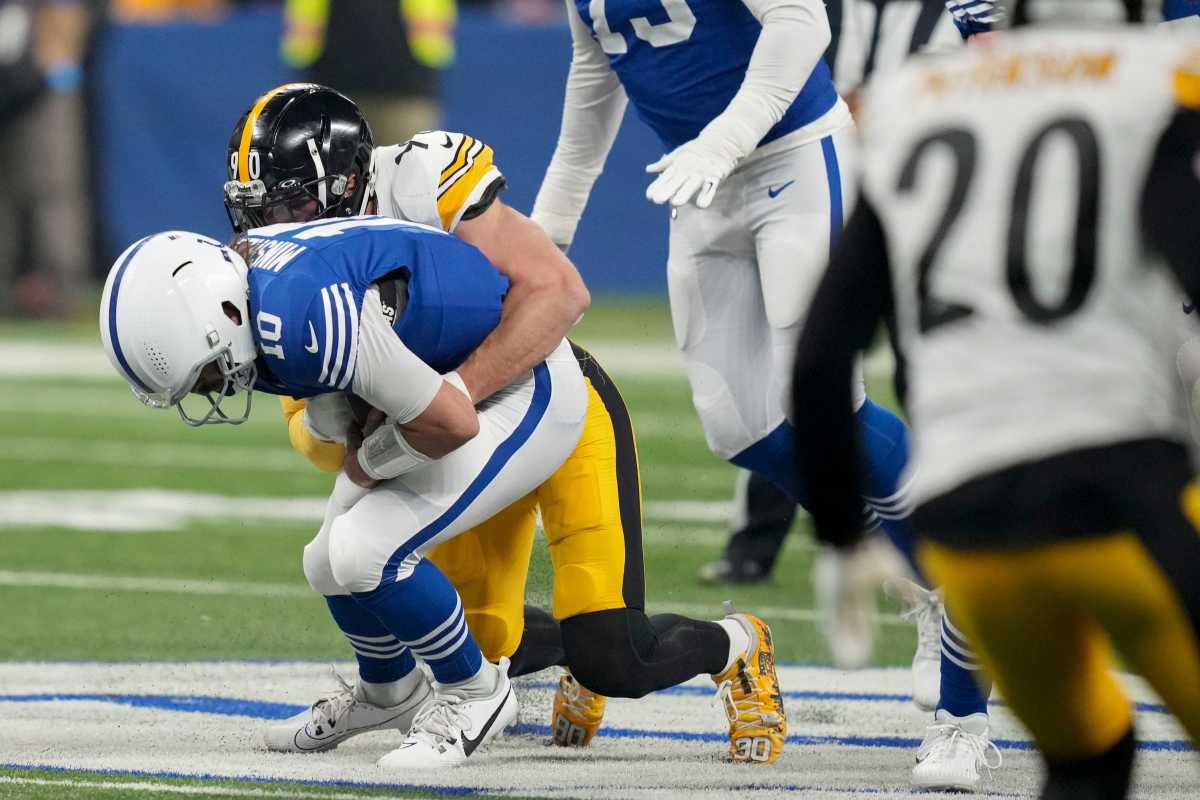 Indianapolis Colts quarterback Gardner Minshew II (10) is brought down by Pittsburgh Steelers linebacker T.J. Watt (90) on Saturday, Dec. 16, 2023, during a game against the Pittsburgh Steelers at Lucas Oil Stadium in Indianapolis.