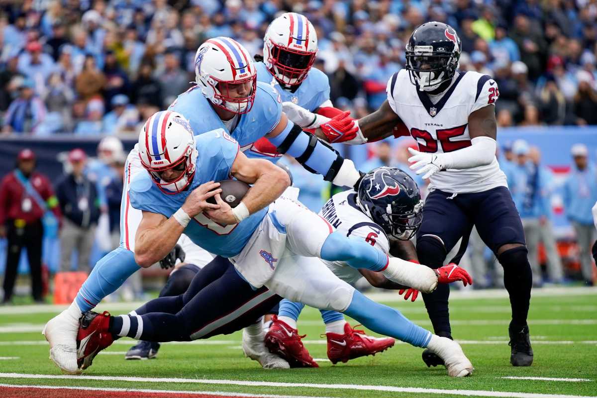 Tennessee Titans quarterback Will Levis (8) dives in for a touchdown against the Houston Texans during the first quarter at Nissan Stadium in Nashville, Tenn., Sunday, Dec. 17, 2023