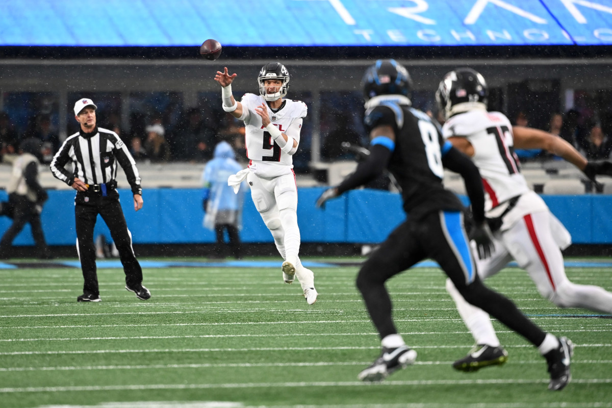 Atlanta Falcons quarterback Desmond Ridder (9) passes the ball to receiver KhaDarel Hodge (12) in the first quarter at Bank of America Stadium.