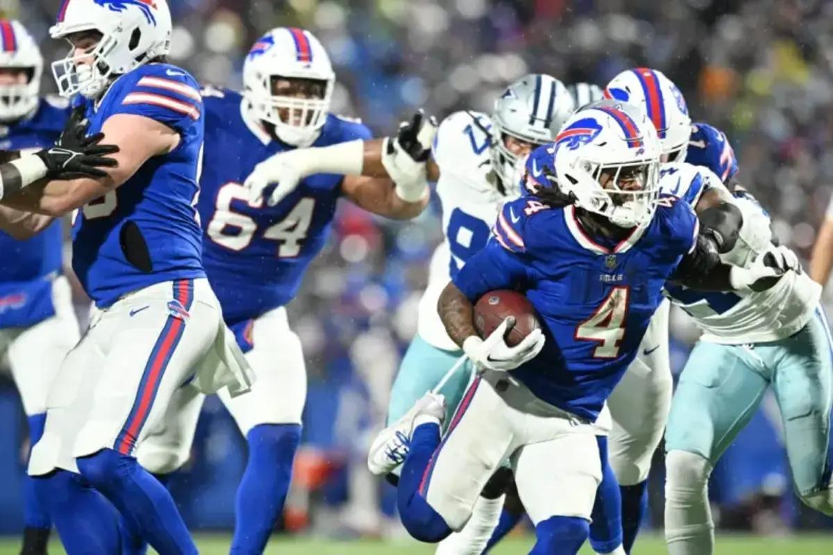 Buffalo Bills running back James Cook rushes for a gain against the Dallas Cowboys.