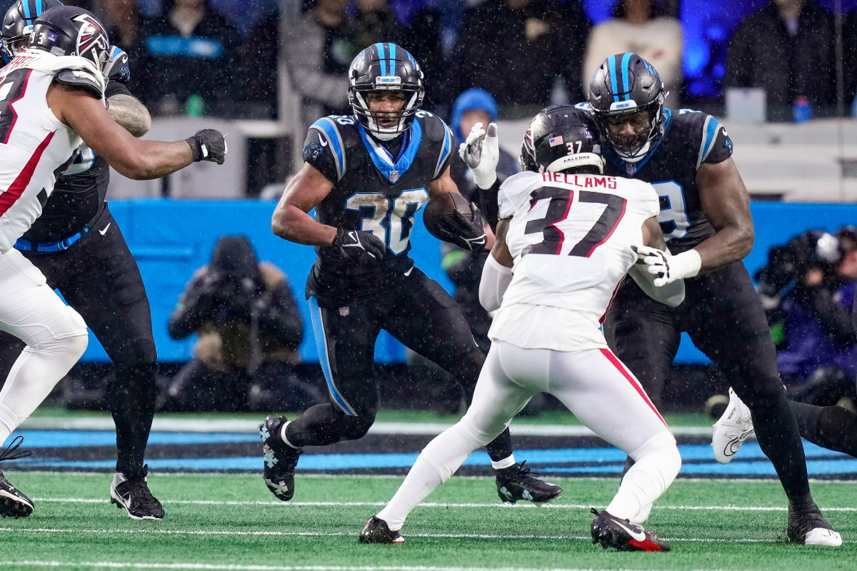 Carolina Panthers running back Chuba Hubbard (30) runs the ball against the Atlanta Falcons during the second quarter at Bank of America Stadium. DeMarcco Hellams