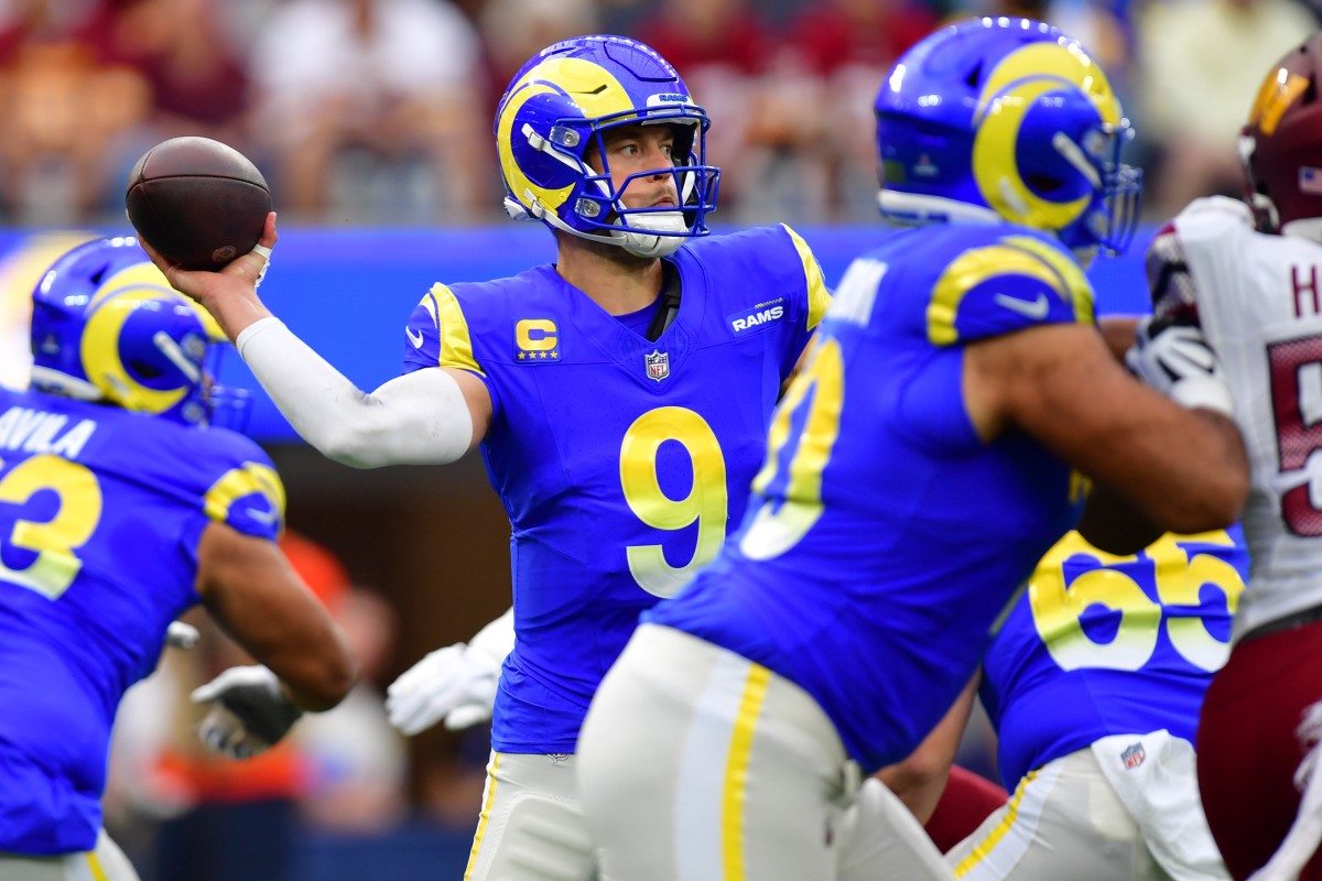 Los Angeles Rams quarterback Matthew Stafford (9) throws against the against the Washington Commanders during the first half at SoFi Stadium.