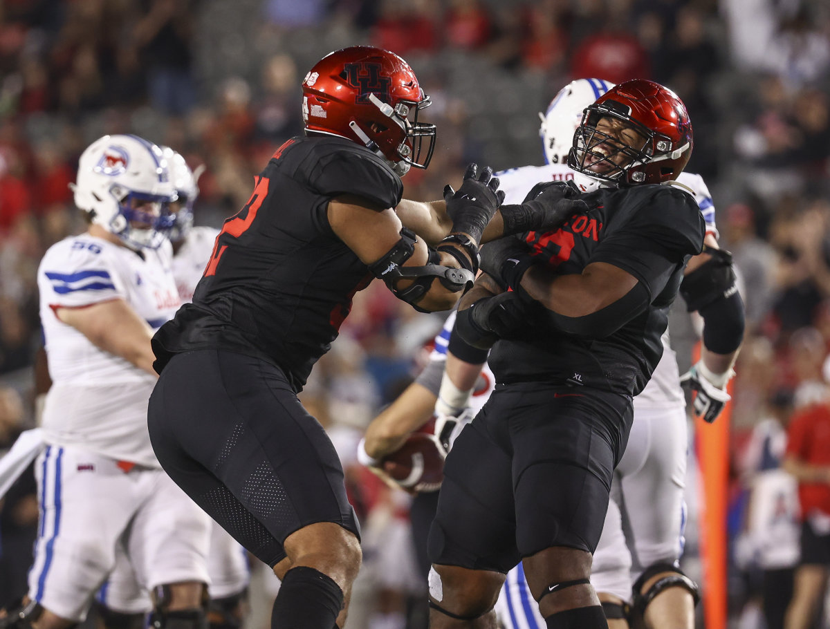 Oct 30, 2021; Houston, Texas, USA; Houston Cougars defensive lineman Chidozie Nwankwo (10) reacts after a play during the fourth quarter against the Southern Methodist Mustangs at TDECU Stadium