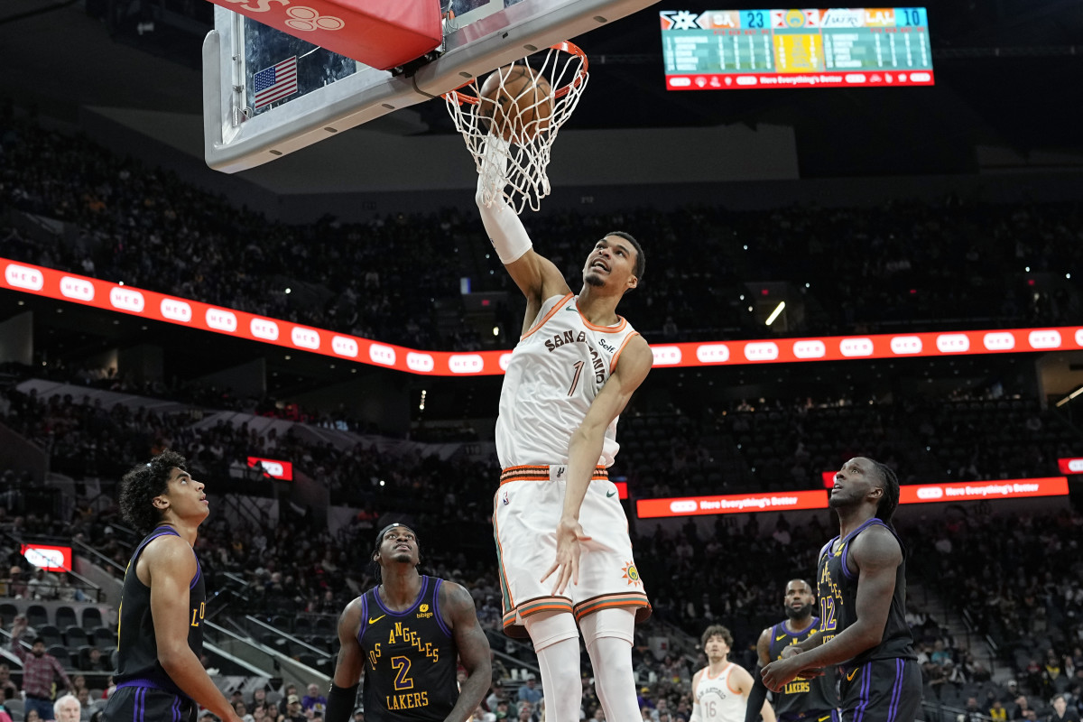 Dec 15, 2023; San Antonio, Texas, USA; San Antonio Spurs forward Victor Wembanyama (1) dunks during the first half against the Los Angeles Lakers at Frost Bank Center.