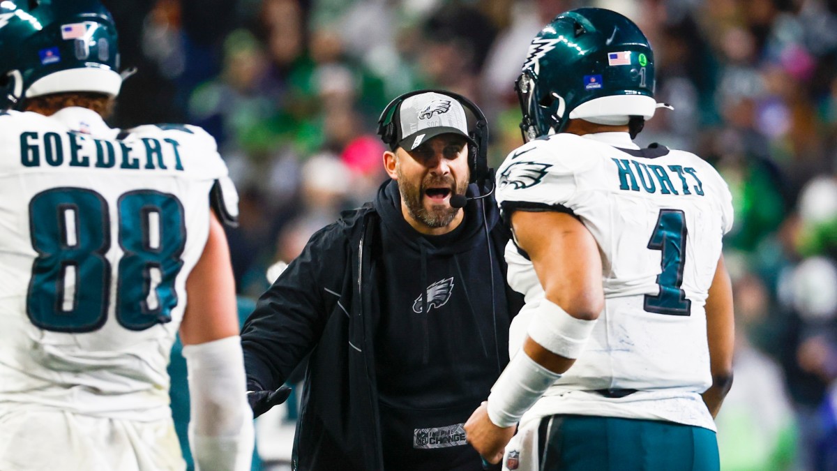 Eagles tight end Dallas Goedert (left), head coach Nick Sirianni (center) and quarterback Jalen Hurts