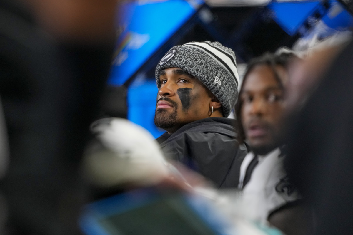 Philadelphia Eagles quarterback Jalen Hurts looks on from the bench during the first half of Monday night’s game against the Seahawks.