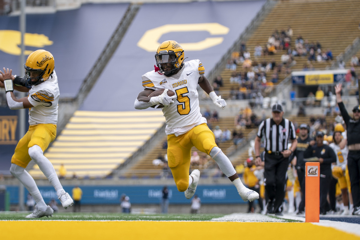  September 16, 2023; Berkeley, California, USA; Idaho Vandals running back Anthony Woods (5) scores a touchdown against the California Golden Bears during the first quarter at California Memorial Stadium. Mandatory Credit: Kyle Terada-USA TODAY Sports