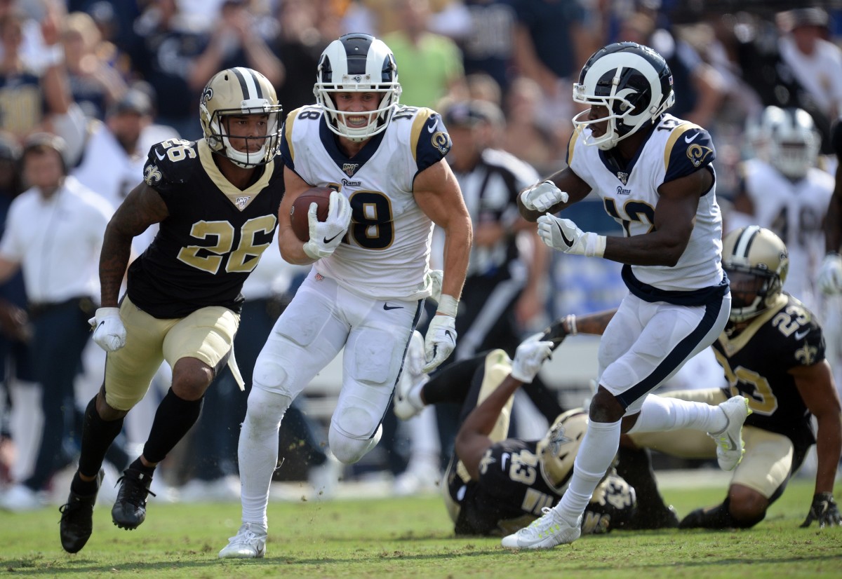 September 15, 2019; Los Angeles Rams receiver Cooper Kupp (18) breaks away for a long gain against the New Orleans Saints. Mandatory Credit: Gary A. Vasquez-USA TODAY Sports