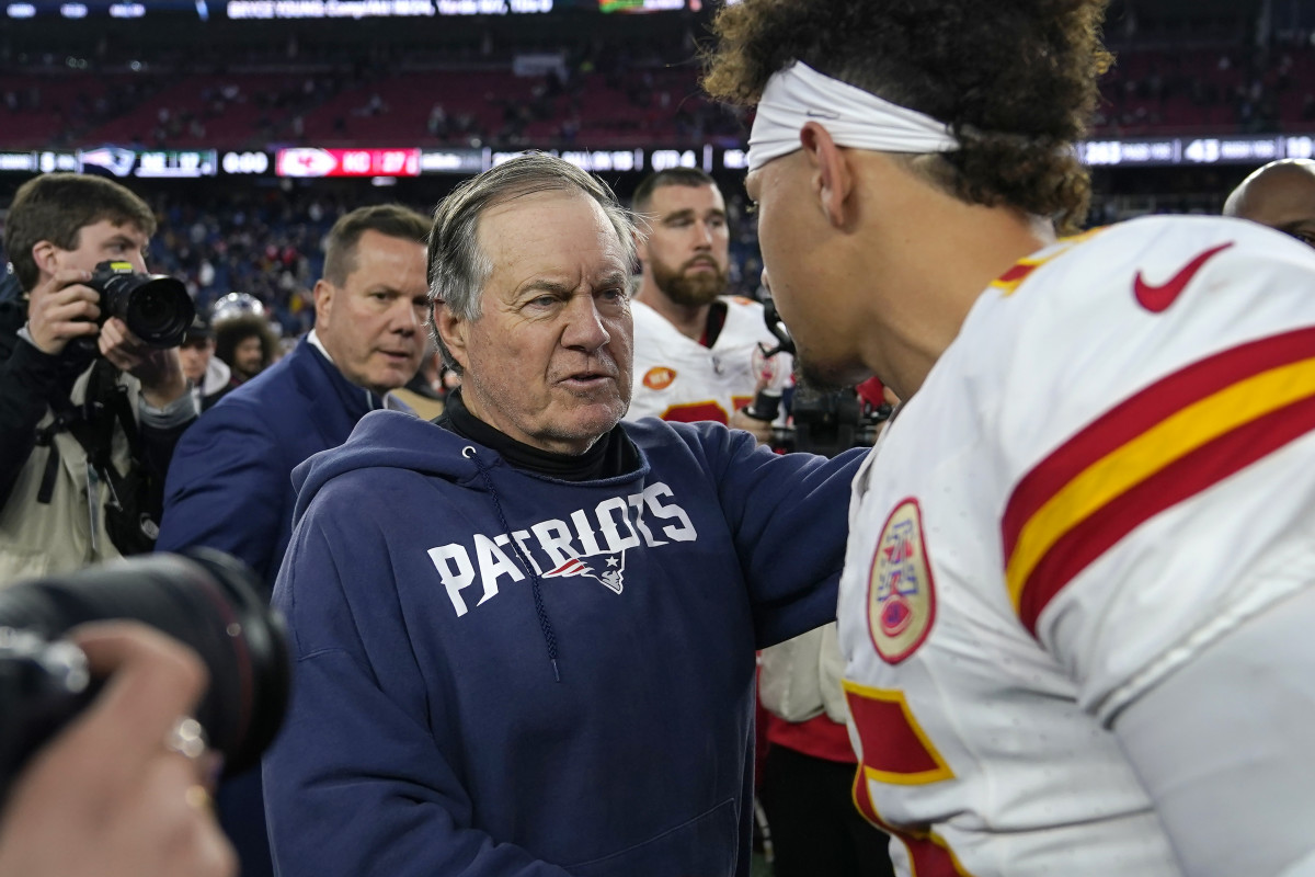New England Patriots head coach Bill Belichick shakes hands with Kansas City Chiefs quarterback Patrick Mahomes, after their Week 15 game.