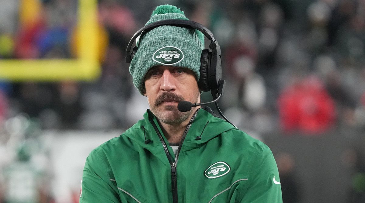 Aaron Rodgers of the Jets on the sidelines while his team plays the Falcons.