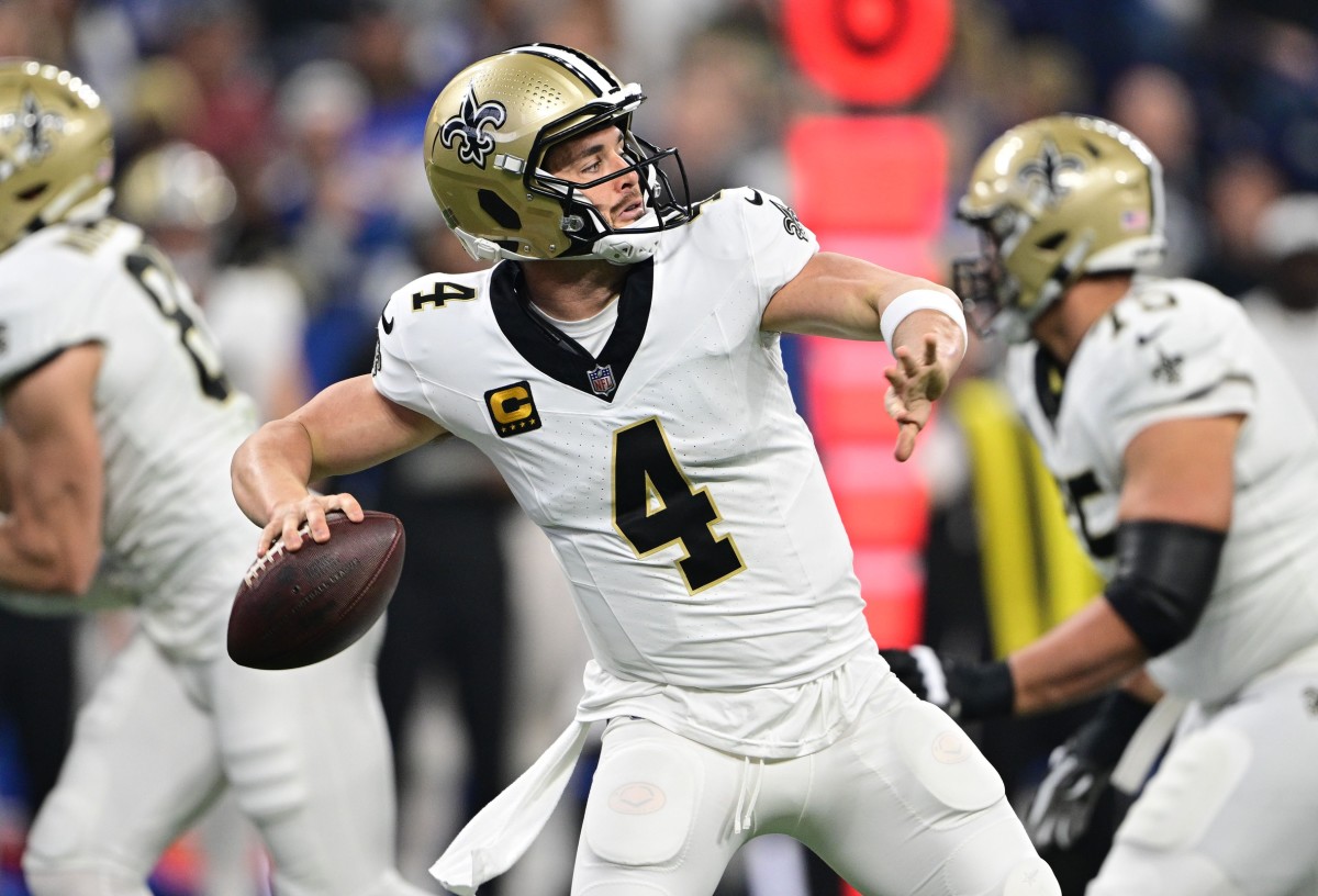 Oct 29, 2023; New Orleans Saints quarterback Derek Carr (4) throws a long pass against the Indianapolis Colts. Mandatory Credit: Marc Lebryk-USA TODAY