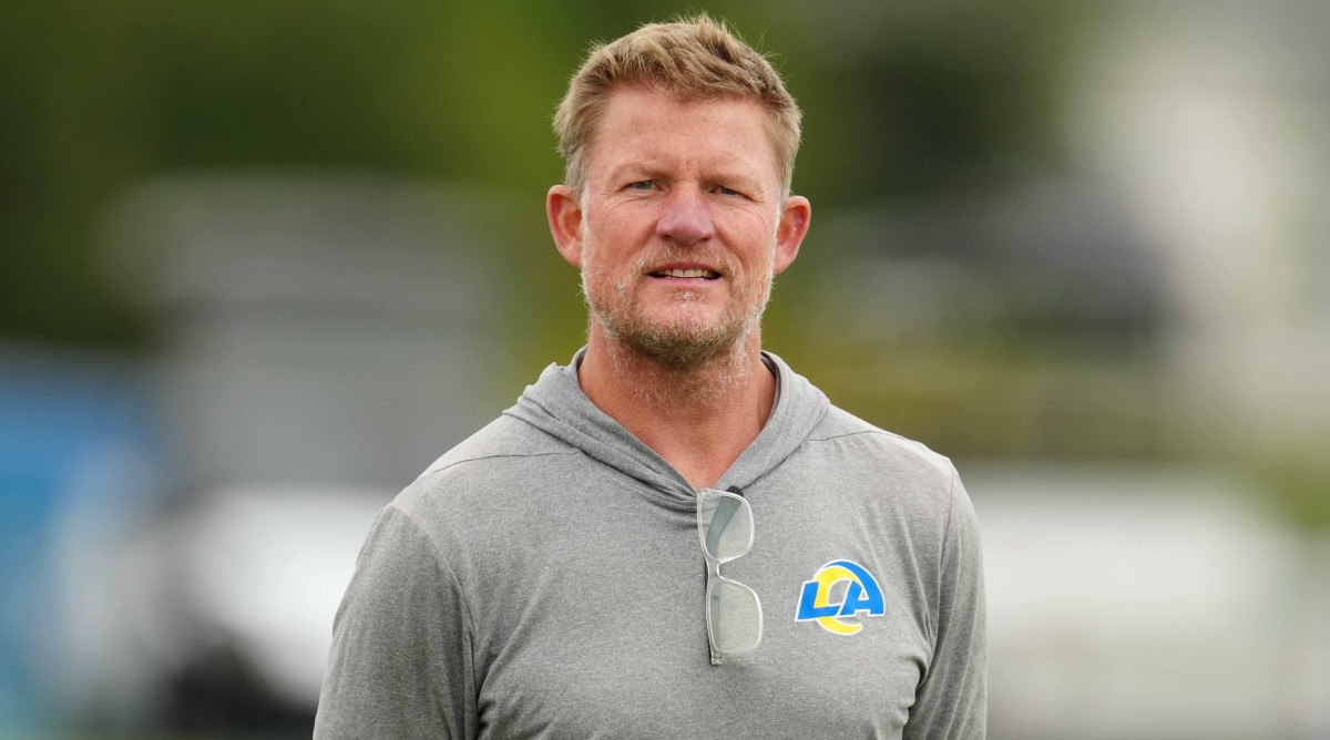 Los Angeles Rams general manager Les Snead looks on during training camp practice.