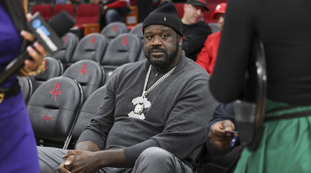 Shaquille O'Neal attends the game between the Houston Rockets and the Dallas Mavericks.