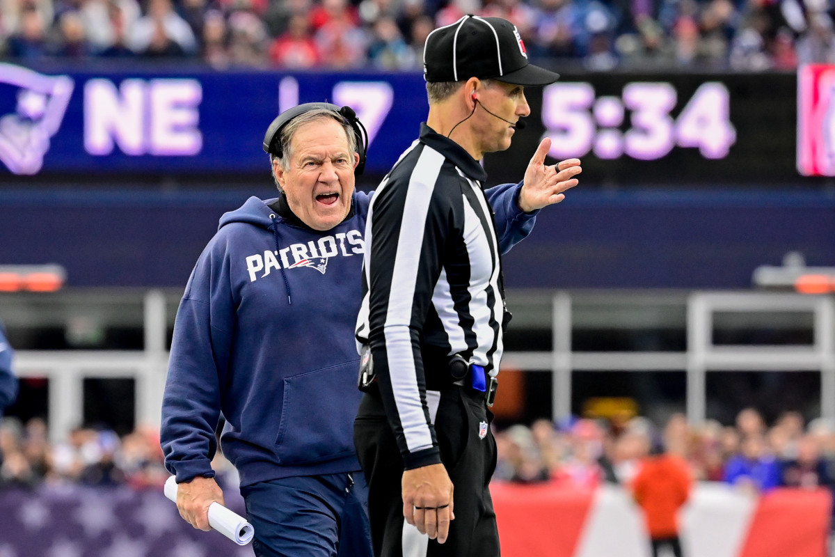 New England Patriots head coach Bill Belichick questions the official during the first half against the Kansas City Chiefs at Gillette Stadium.