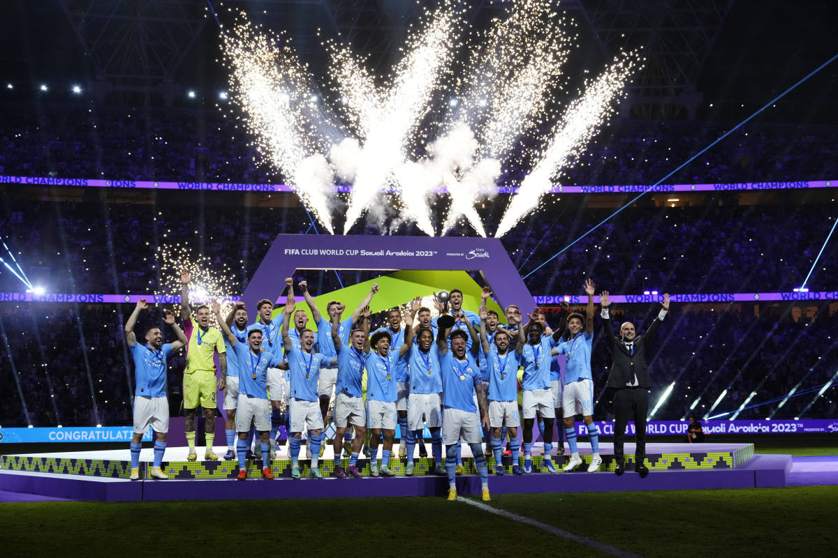 Kyle Walker pictured (front) lifting the FIFA Club World Cup trophy after Manchester City beat Fluminense 4-0 in the 2023 final