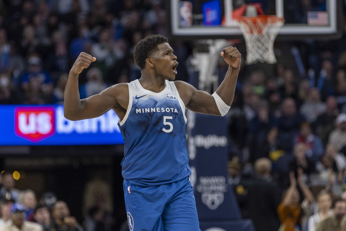 Dec 21, 2023; Minneapolis, Minnesota, USA; Minnesota Timberwolves guard Anthony Edwards (5) celebrates after making a shot against the Los Angeles Lakers in the second half at Target Center.