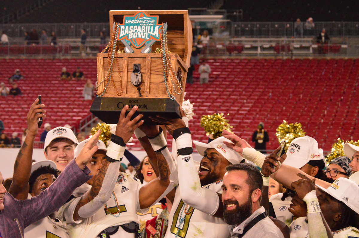 Georgia Tech being presented the trophy for the Gasparilla Bowl
