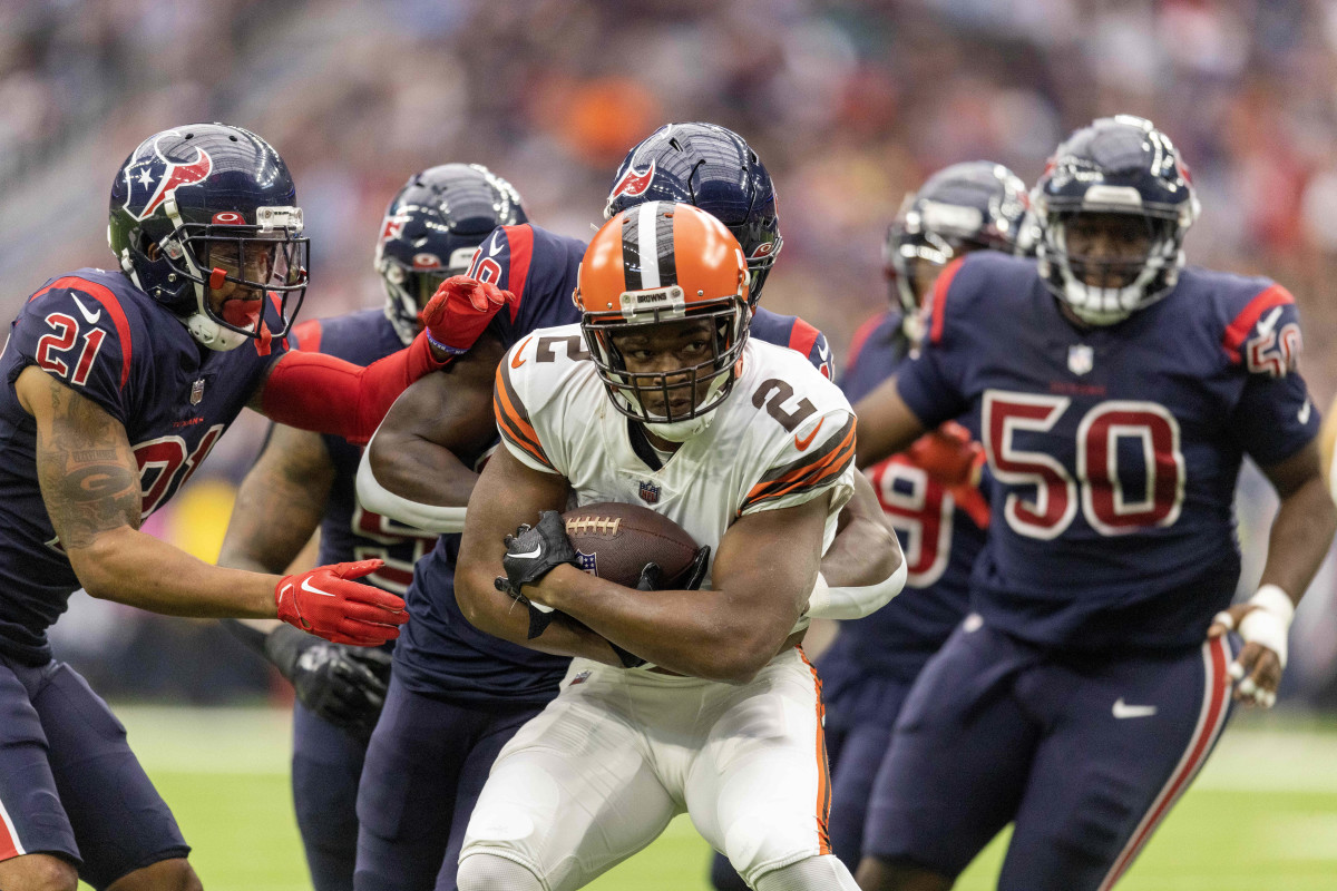 Cleveland Browns Amari Coooper drives past multiple Houston Texans defenders after a gain of 53 yards in the first quarter at NRG Stadium in Houston, Texas. 