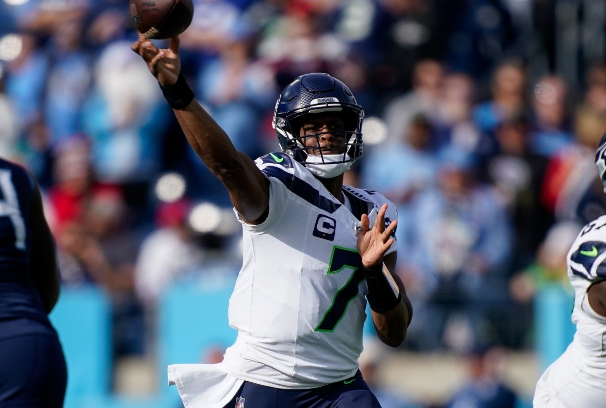Seattle Seahawks quarterback Geno Smith (7) throws against the Tennessee Titans during the first quarter at Nissan Stadium in Nashville, Tenn.,