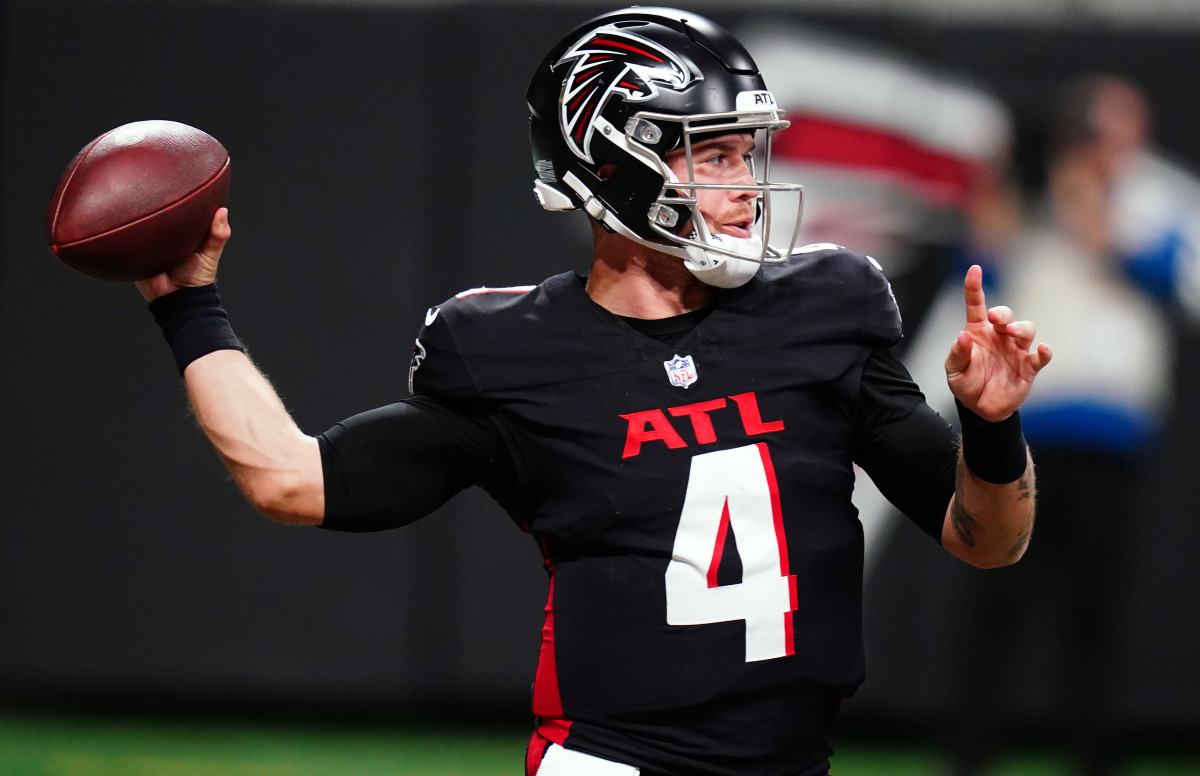 Atlanta Falcons quarterback Taylor Heinicke (4) passing against the Indianapolis Colts during the first half at Mercedes-Benz Stadium.