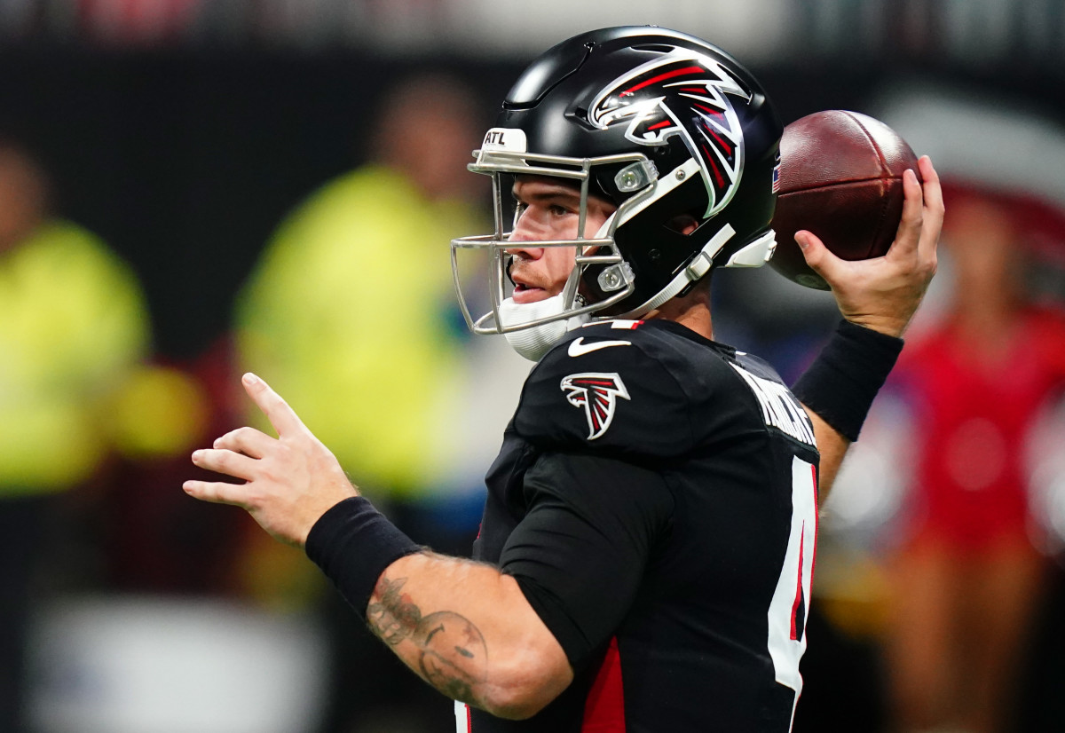 Atlanta Falcons quarterback Taylor Heinicke (4) looks to pass against the Indianapolis Colts during the first half at Mercedes-Benz Stadium.