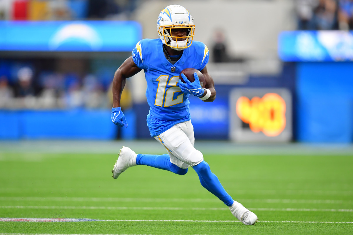Oct 1, 2023; Inglewood, California, USA; Los Angeles Chargers wide receiver Derius Davis (12) runs the ball against the Las Vegas Raiders during the first half at SoFi Stadium. Mandatory Credit: Gary A. Vasquez-USA TODAY Sports