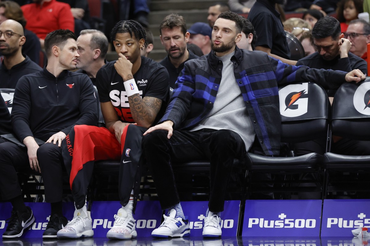 Injured Chicago Bulls guard Zach LaVine (8) sits on the bench during the second half at United Center.