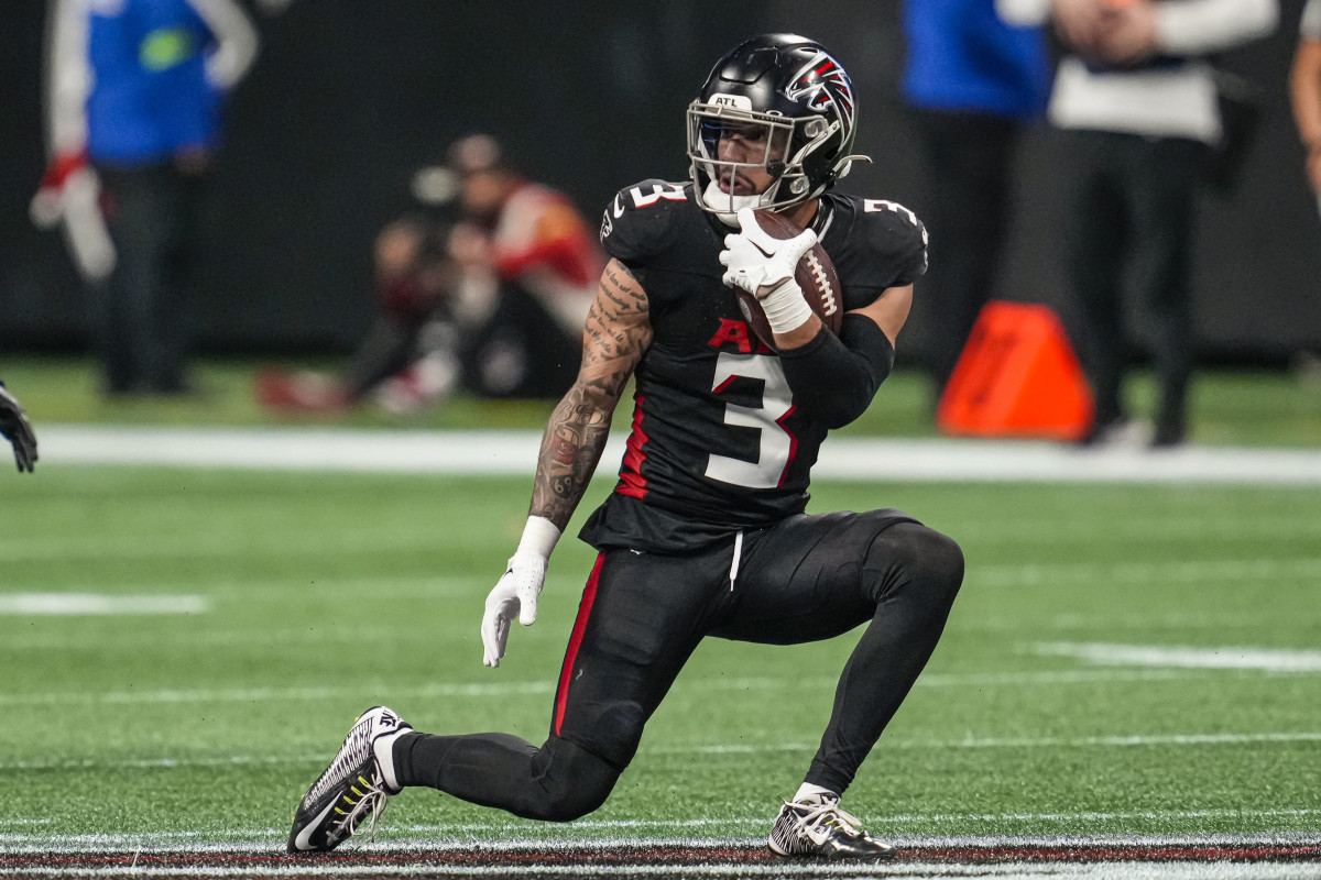 Atlanta Falcons safety Jessie Bates III (3) runs after intercepting a pass against the Indianapolis Colts during the second half at Mercedes-Benz Stadium.