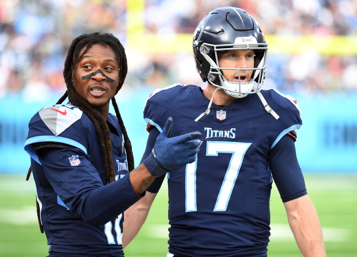 Tennessee Titans wide receiver DeAndre Hopkins (10) talks with quarterback Ryan Tannehill (17) after a play during the second half against the Seattle Seahawks at Nissan Stadium. Mandatory Credit: Christopher Hanewinckel-USA TODAY Sports