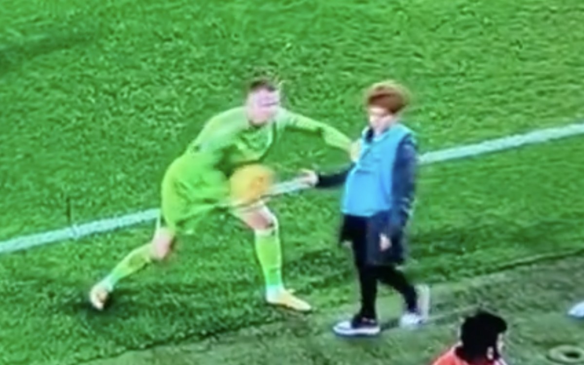 Fulham goalkeeper Bernd Leno pictured (left) pushing a Bournemouth ball boy during a Premier League game on Boxing Day in 2023