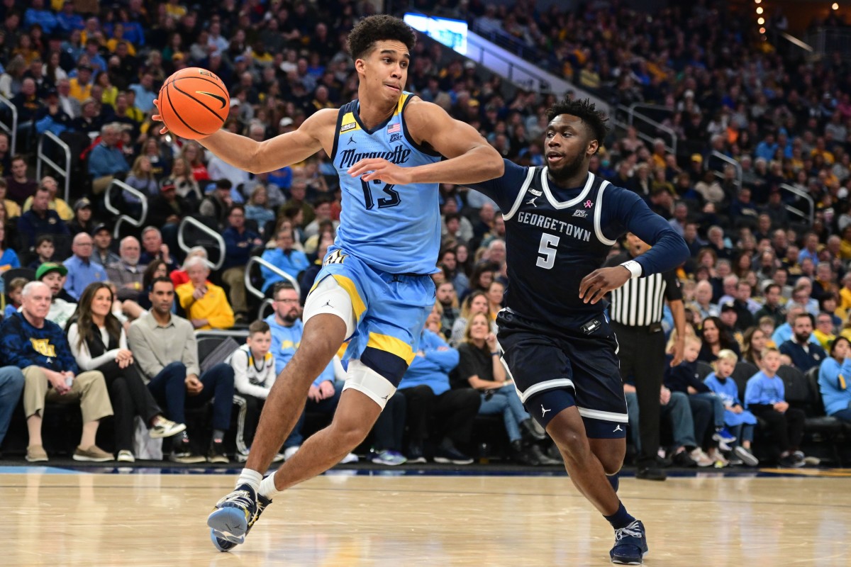 Marquette Golden Eagles forward Oso Ighodaro drives against the Georgetown Hoyas