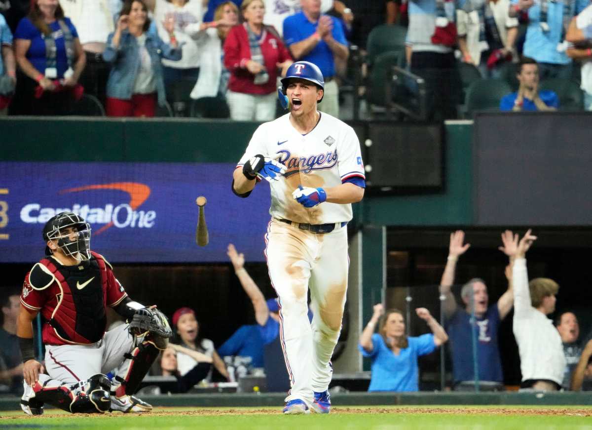 Texas Rangers Corey Seager reacts after connecting for a game-tying, two-run home run off Arizona Diamondbacks relief pitcher Paul Sewald in the ninth inning during Game 1 of the World Series at Globe Life Field.