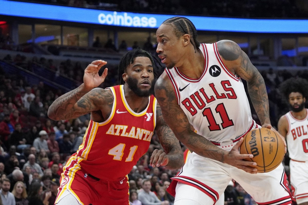 Chicago Bulls forward DeMar DeRozan (11) looks for an opening while Atlanta Hawks forward Saddiq Bey (41) defends during the first quarter at United Center. 