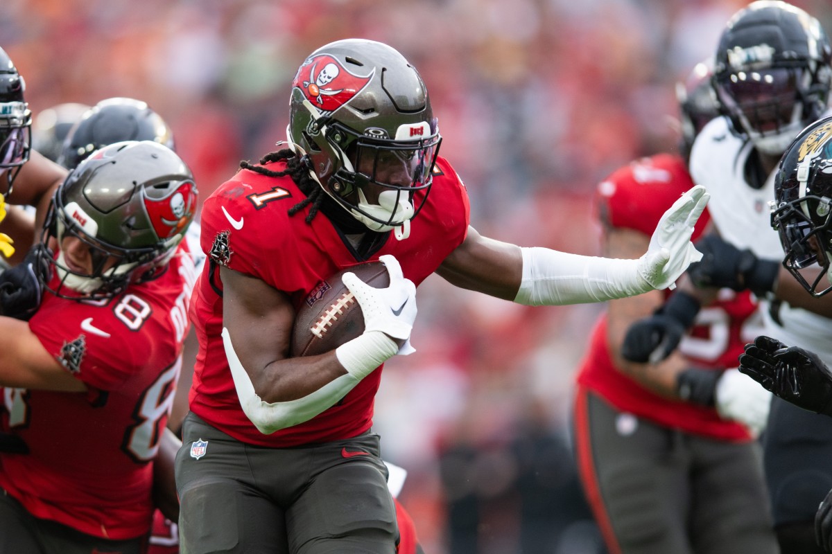 Tampa Bay Buccaneers running back Rachaad White (1) runs the ball against the Jacksonville Jaguars. Mandatory Credit: Jeremy Reper-USA TODAY Sports