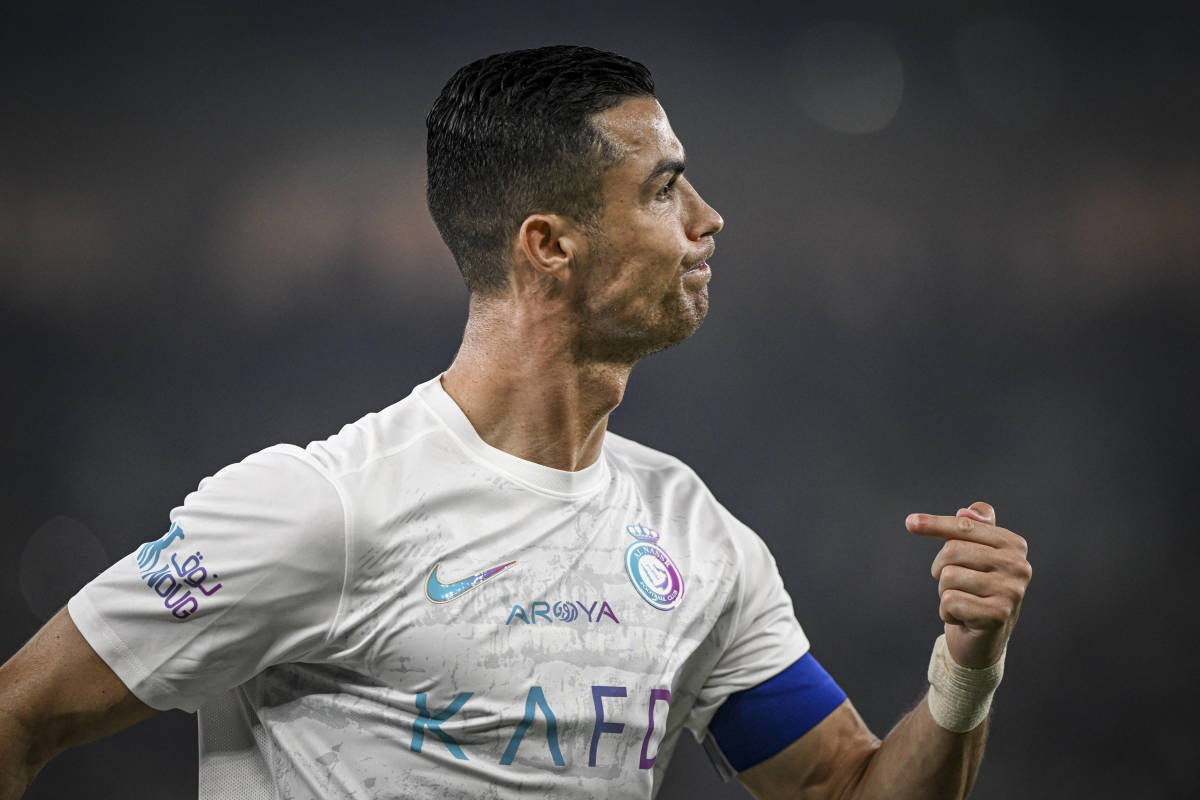 Cristiano Ronaldo pictured celebrating during Al Nassr's 5-2 win over Al-Ittihad in December 2023 - a game in which he scored his 52nd and 53rd goals of the calendar year