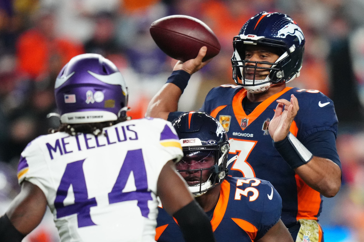 Nov 19, 2023; Denver, Colorado, USA; Denver Broncos quarterback Russell Wilson (3) drops back to pass against the Minnesota Vikings in the first quarter at Empower Field at Mile High.