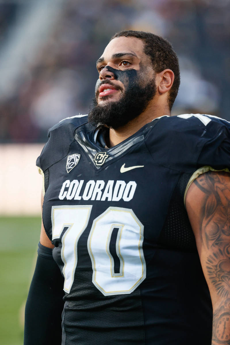 Colorado Buffaloes offensive lineman Casey Roddick looks at the action from the sideline vs. Oregon State.