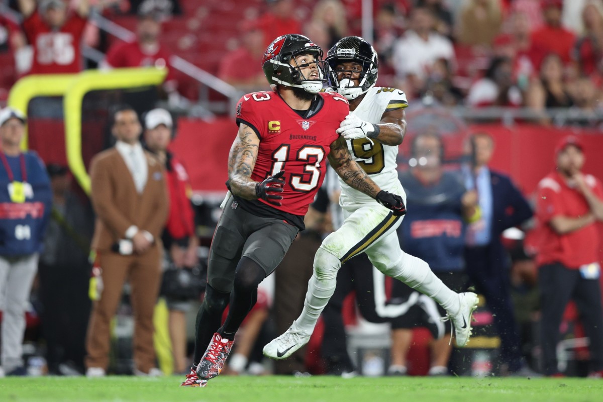 New Orleans Saints cornerback Paulson Adebo (29) covers Tampa Bay Buccaneers wide receiver Mike Evans (13). Mandatory Credit: Nathan Ray Seebeck-USA TODAY Sports
