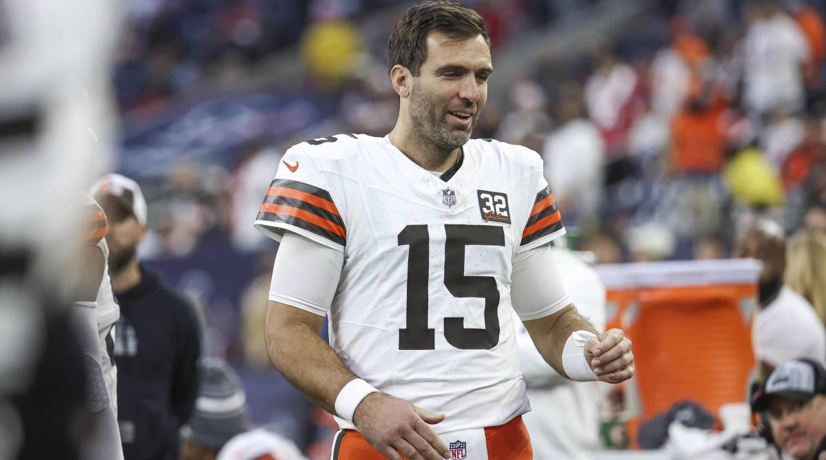Cleveland Browns quarterback Joe Flacco smiles after defeating the Houston Texans in a game.