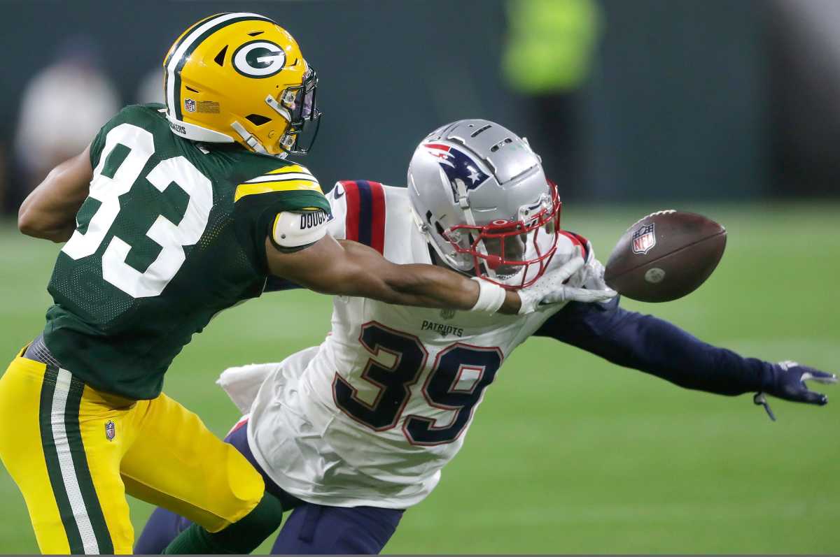 New England Patriots cornerback Rodney Randle Jr. (39) breaks up a pass to Green Bay Packers wide receiver Samori Toure (83) during their preseason football game Saturday, August 19, 2023, at Lambeau Field in Green Bay, Wis. The game was suspended in the fourth quarter following an injury to New England Patriots cornerback Isaiah Bolden (7). Wm. Glasheen USA TODAY NETWORK-Wisconsin  
