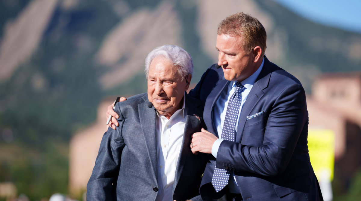 Kirk Herbstreit holds his fellow ‘College GameDay’ analyst Lee Corso during a Sept. 2023 episode at Colorado.