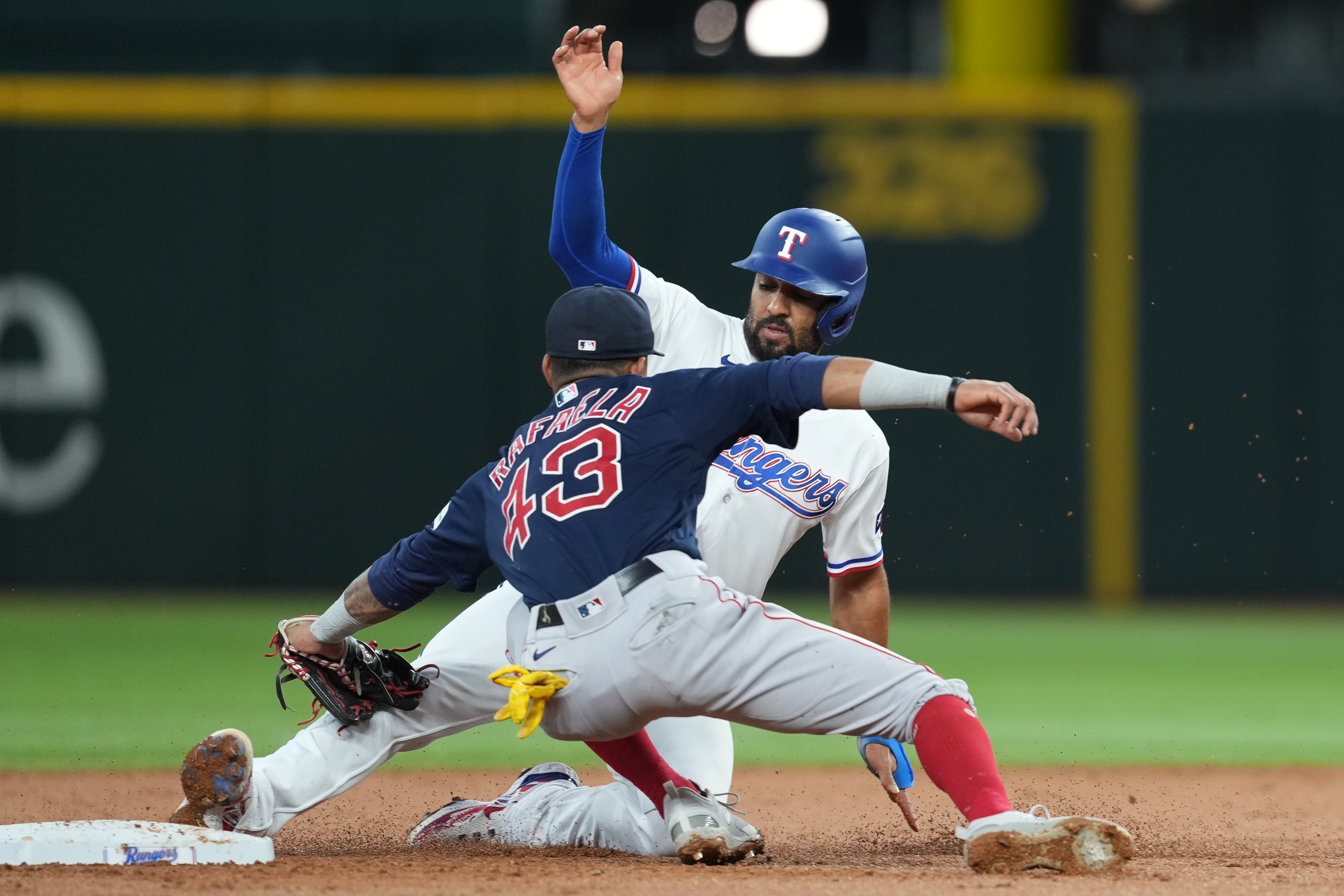 Texas Rangers second baseman Marcus Semien is forced out at second by Boston Red Sox shortstop Ceddanne Rafaela during the second inning at Globe Life Field. (2023)