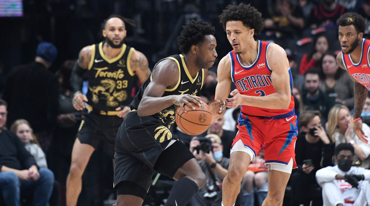 Toronto Raptors forward OG Anunoby dribbles against Detroit Pistons guard Cade Cunningham during a 2021 game.