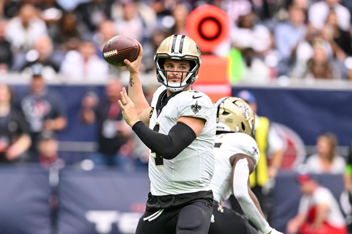 New Orleans Saints quarterback Derek Carr (4) looks to pass the ball. Mandatory Credit: Maria Lysaker-USA TODAY Sports