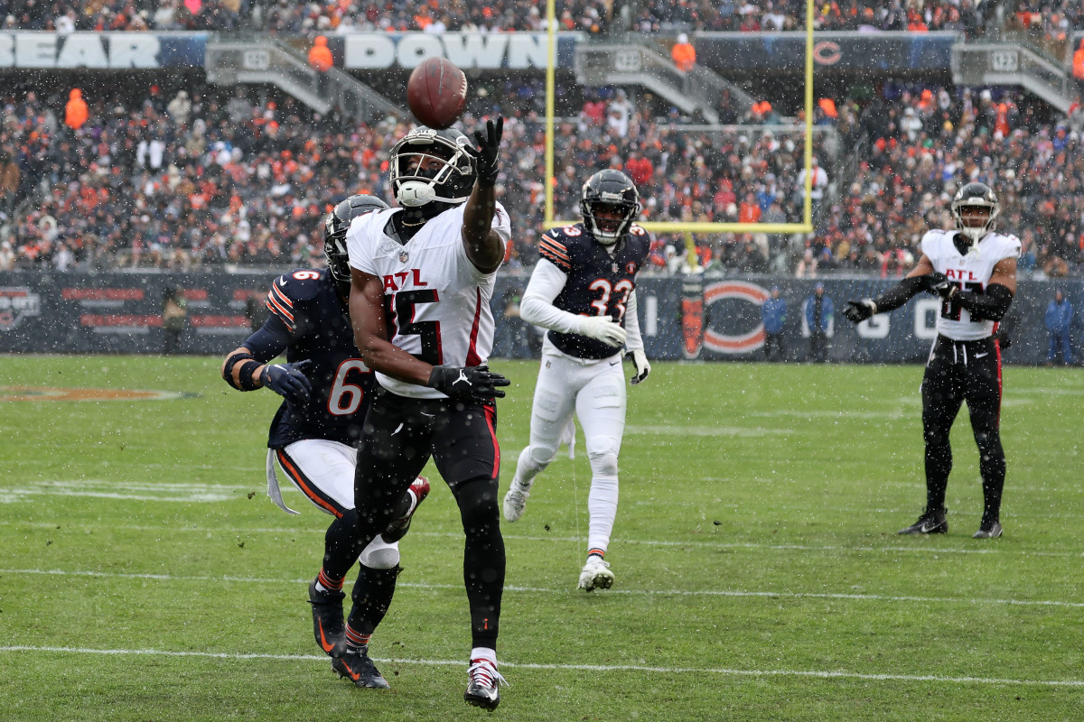Dec 31, 2023; Chicago, Illinois, USA; Atlanta Falcons wide receiver Van Jefferson (15) attempts to make a catch over Chicago Bears cornerback Kyler Gordon (6) during the first half at Soldier Field.