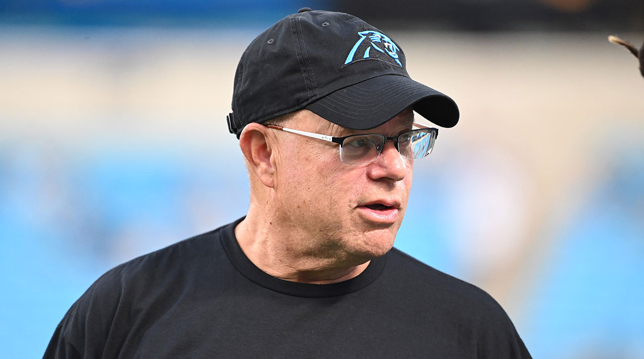 Carolina owner David Tepper wearing a Panthers hat and T-shirt.
