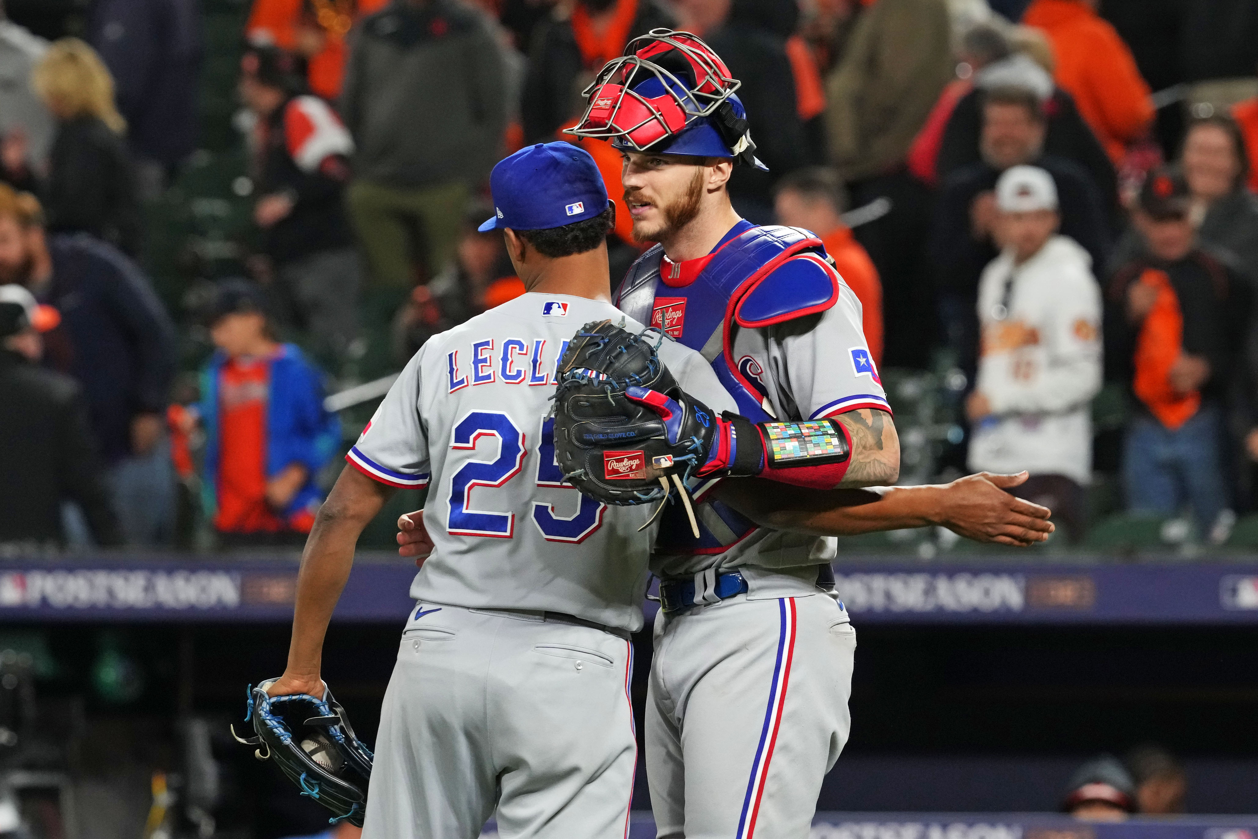 Texas Rangers reliever Jose Leclerc celebrates with catcher Jonah Heim after beating the Baltimore Orioles in Game 2 of the ALDS on Oct. 8 at Camden Yards.