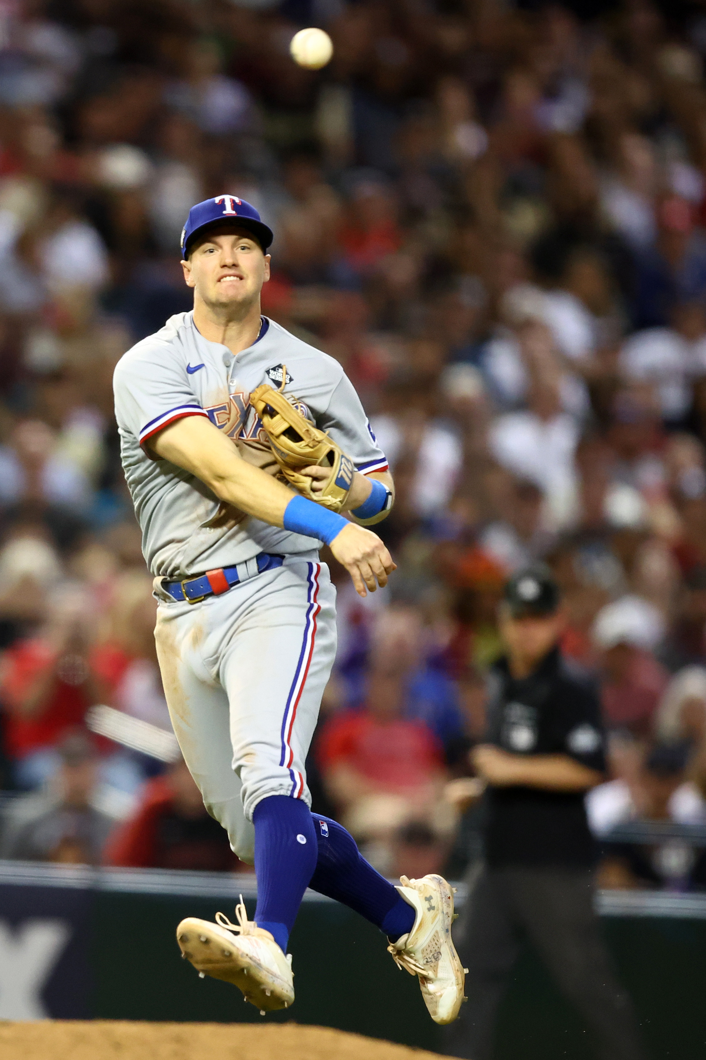 Texas Rangers third baseman Josh Jung makes a throw to first base against the Arizona Diamondbacks during the sixth inning in Game 4 of the 2023 World Series at Chase Field.