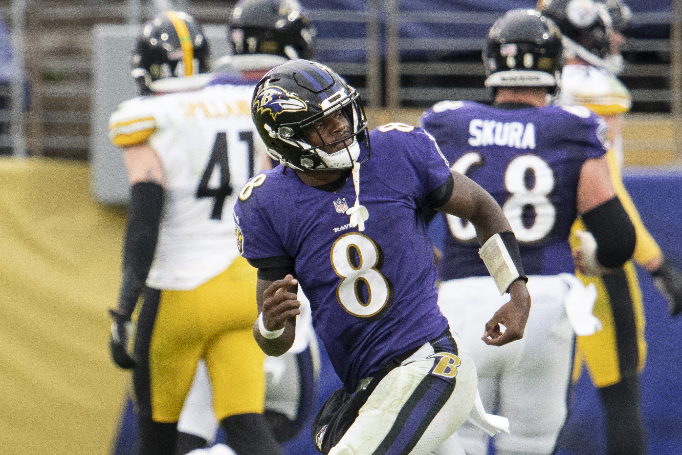 Nov 1, 2020; Baltimore, Maryland, USA; Baltimore Ravens quarterback Lamar Jackson (8) reacts after throwing a second half touchdown against the Pittsburgh Steelers at M&T Bank Stadium. 